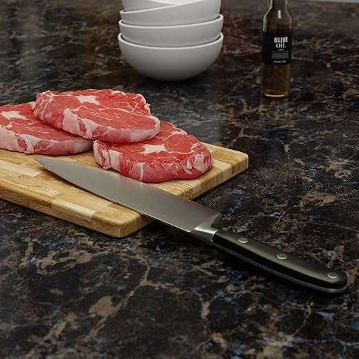 giesser bestcut koksmes 20 cm op tafelblad snijplank met vlees