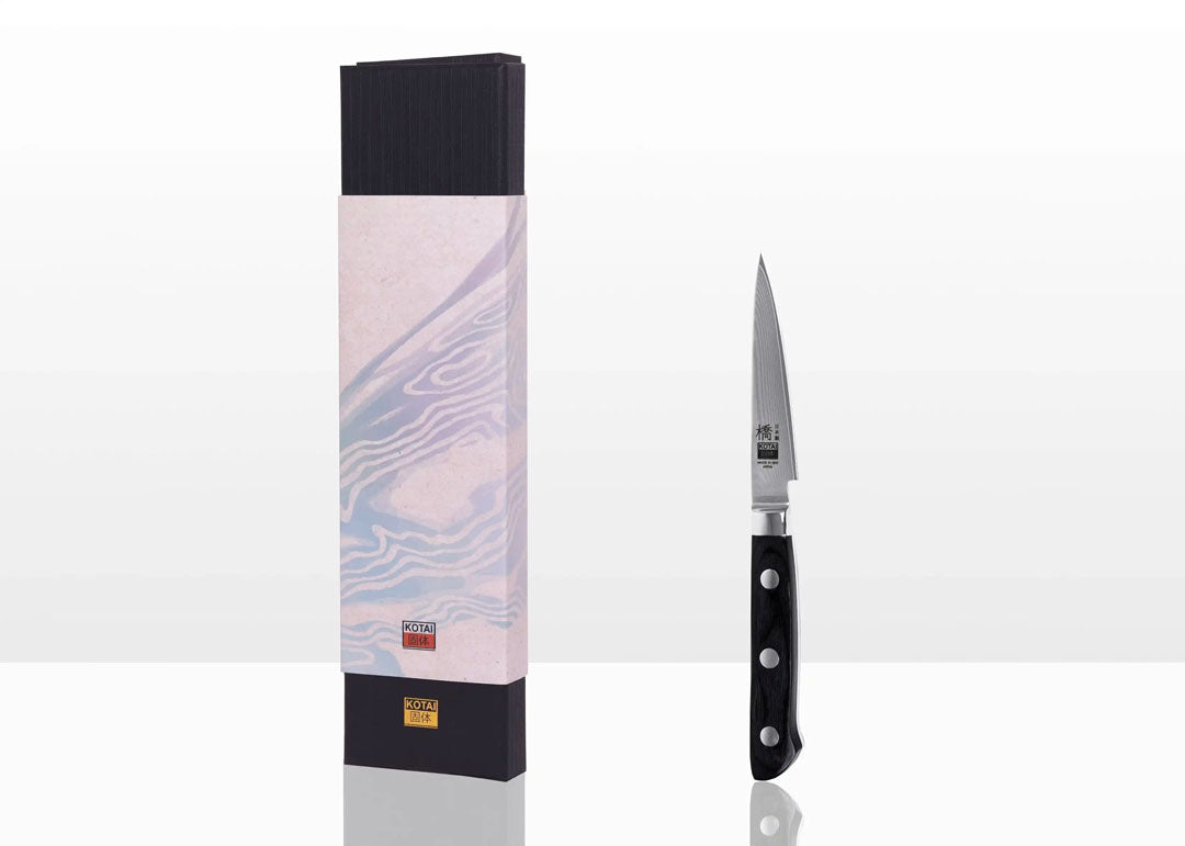 KOTAI Hashi Damascus Schilmes naast de geschenkverpakking